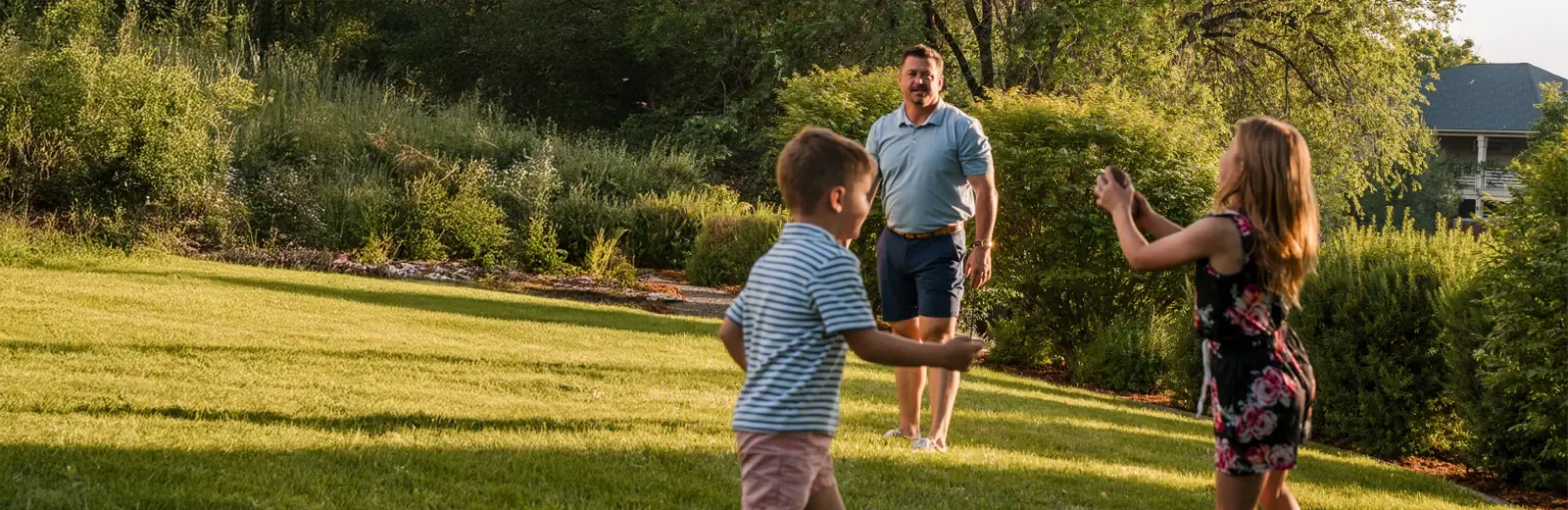 hero-family-playing-backyard