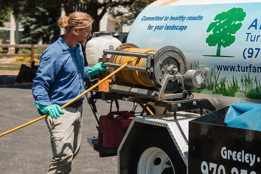 technician winding hose